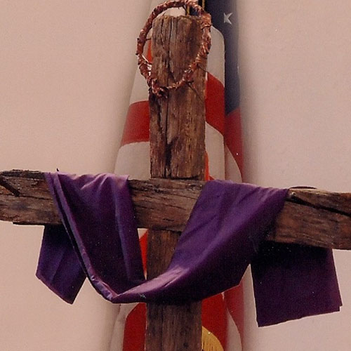 Cross with shroud