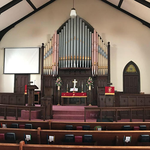 Pipe organ in church sanctuary